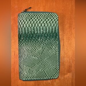 Green alligator skin clutch